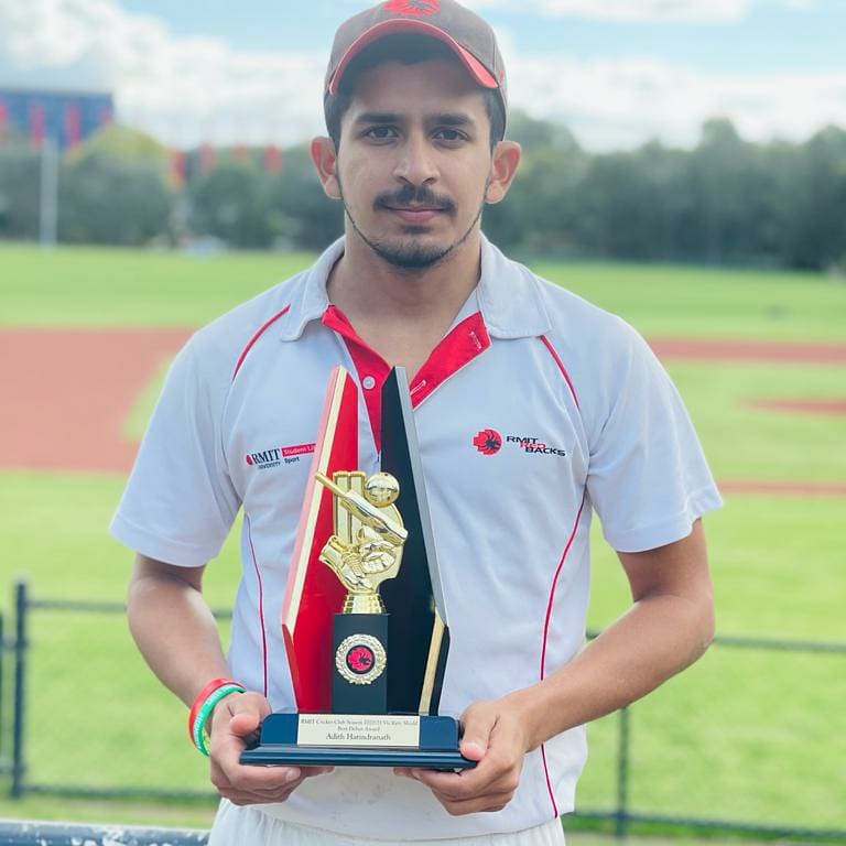 Adith Posing with his Trophy